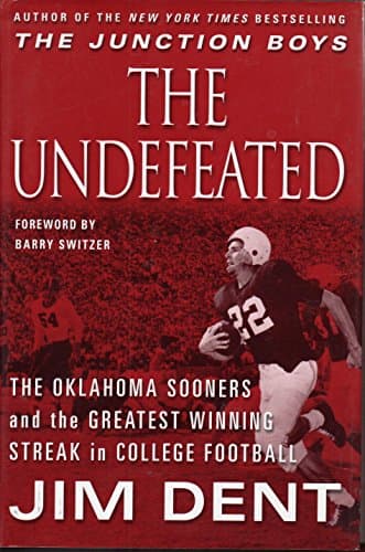 Book cover for The Undefeated: The Oklahoma Sooners and the Greatest Winning Streak in College Football by Dent, Jim