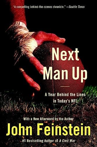 Book cover for Next Man Up: A Year Behind the Lines in Today's NFL by Feinstein, John