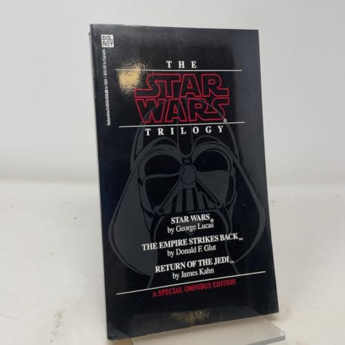 Book cover for The Star Wars Trilogy (Ep. IV: A New Hope; Ep. V: The Empire Strikes Back; Ep. VI: Return of the Jedi) by George Lucas