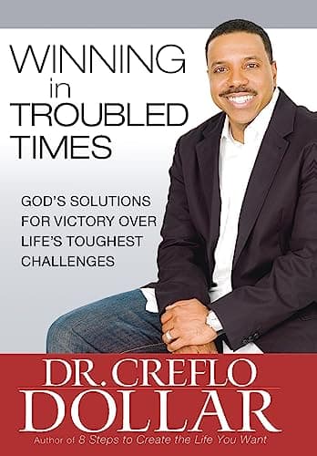 Book cover for Winning in Troubled Times: God's Solutions for Victory Over Life's Toughest Challenges by Dollar, Dr. Creflo