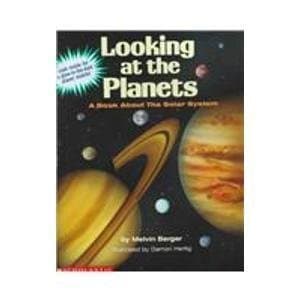 Book cover for Looking at the Planets: A Book About the Solar System/With a Glow in the Dark Planet Mobile by Berger, Melvin