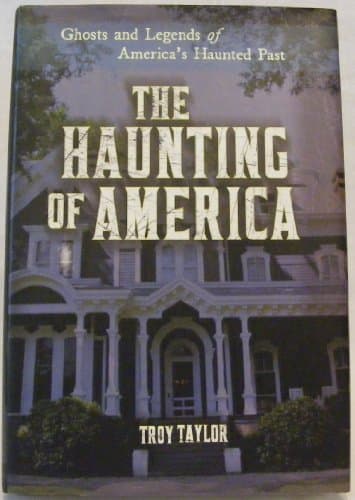 Book cover for The Haunting of America: Ghosts and Legends of America's Haunted Past by Troy Taylor
