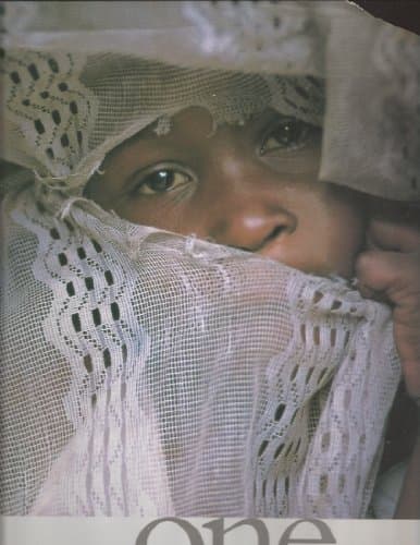 Book cover for One: Celebrating 50 Years of Compassion by Wess K. Stafford, Ph.D.