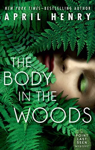Book cover for The Body in the Woods: A Point Last Seen Mystery (Point Last Seen, 1) by Henry, April
