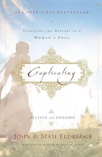 Book cover for Captivating Revised and Updated: Unveiling the Mystery of a Woman's Soul by John Eldredge