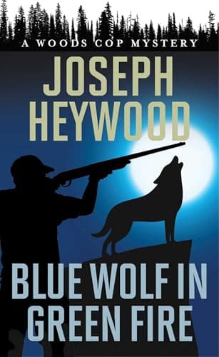 Book cover for Blue Wolf in Green Fire: A Woods Cop Mystery by Heywood, Joseph