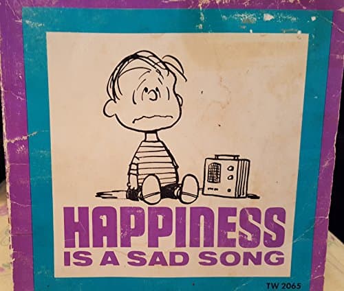 Book cover for Happiness is a sad song by Schulz, Charles M