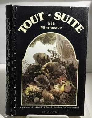 Book cover for TOUT DE SUITE A LA MICROWAVE: A gourmet's cookbook of French, Acadian & Creole recipes by Durkee, Jean K.