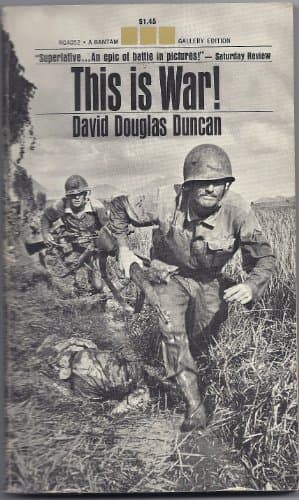 Book cover for This is war! A Photo-Narrative in Three Parts by Duncan, David Douglas